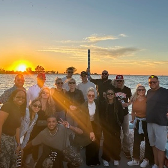 The ArmCoa team enjoying a sunset outing—showcasing company culture, unity, and the people behind the builds.